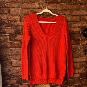 Bright red v-neck sweater